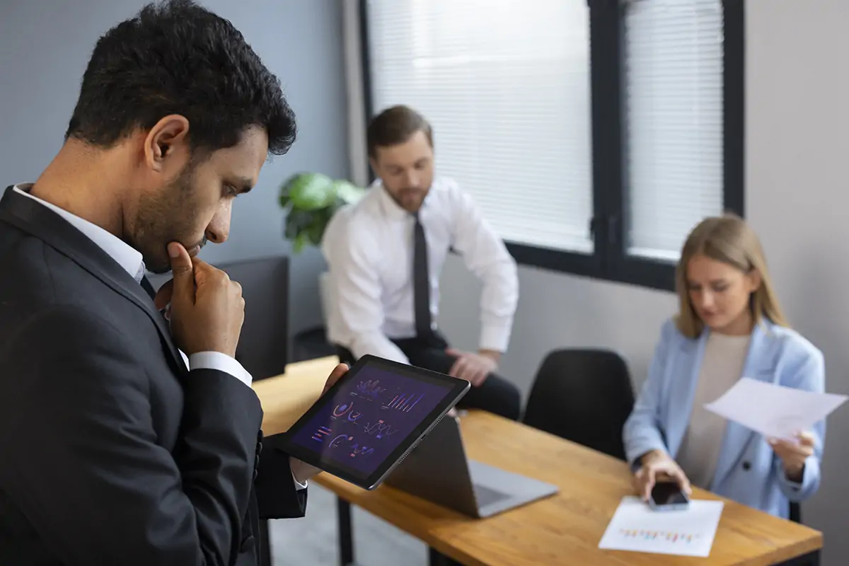 Business Person Looking Finance Graphs